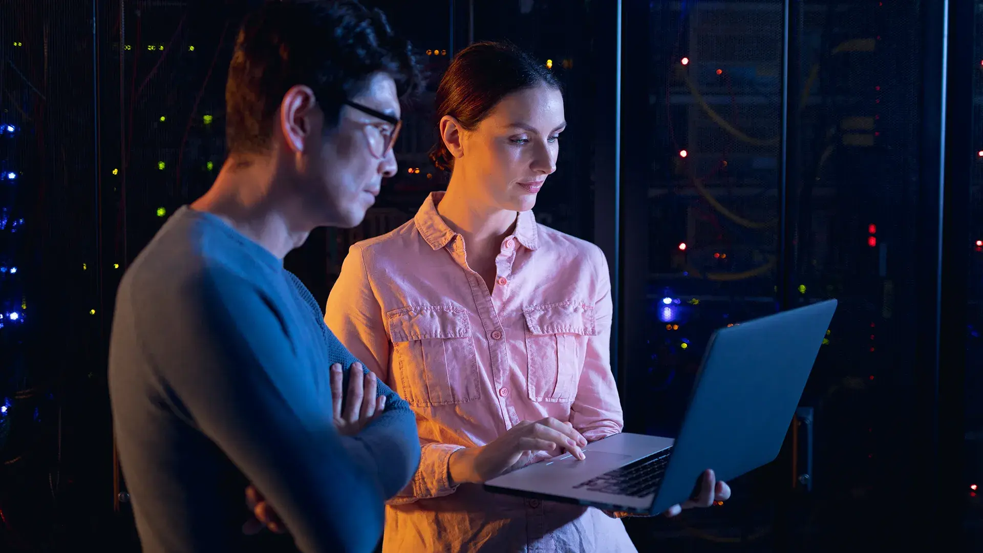 Two person standing in a data infrastructure