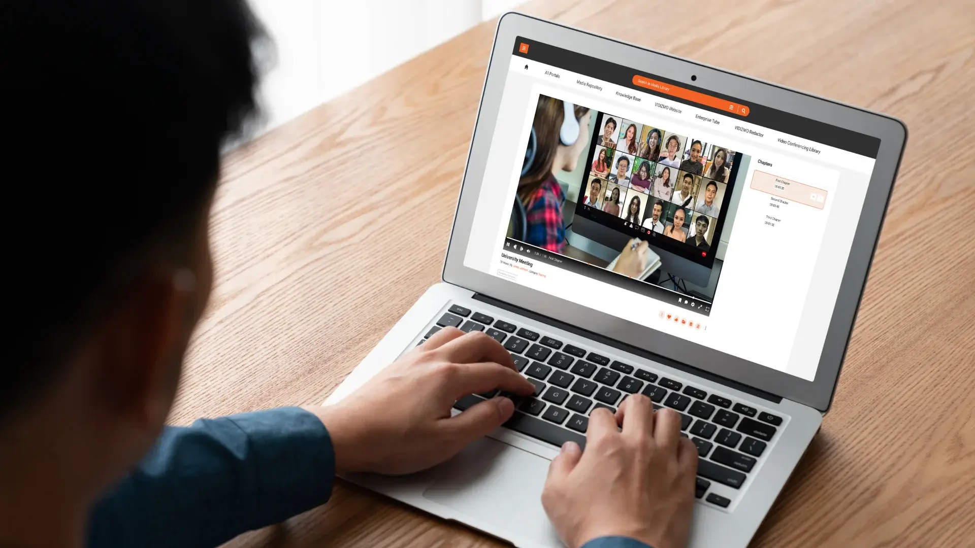 a person searching through testimonial video library