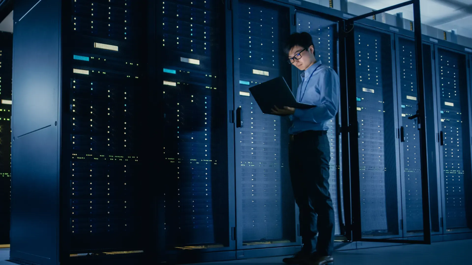a person standing in a on prem data center