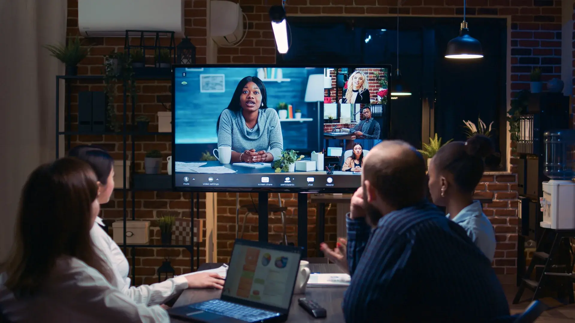 Employees watching a live meeting via an enterprise video hosting solution