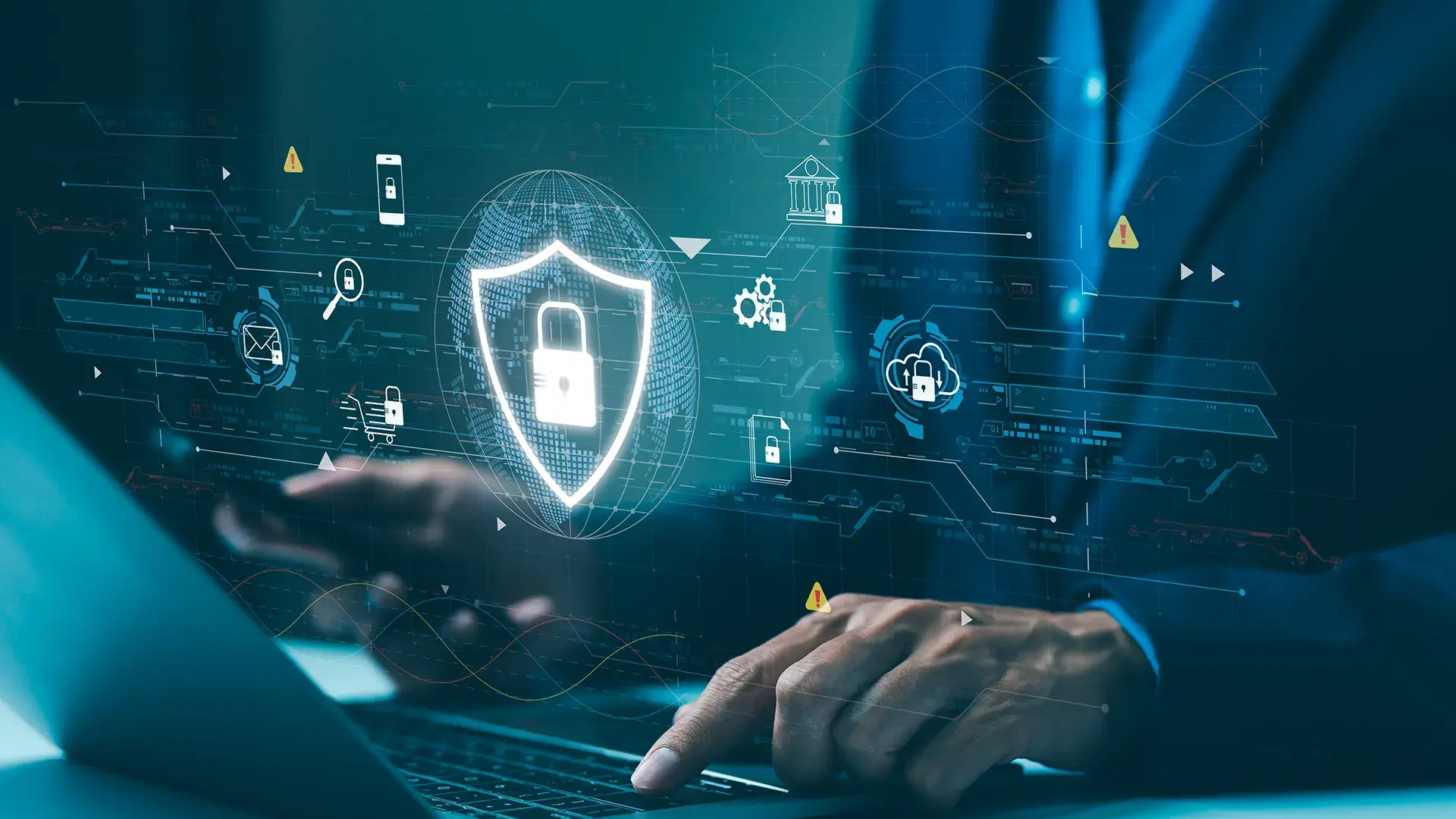 Person using a laptop with digital cybersecurity and data protection icons on screen.